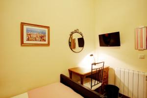Postel nebo postele na pokoji v ubytování Málaga Lodge Guesthouse