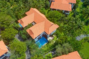 an overhead view of a house with an orange roof at Abogo Resort Villa Beach Premium in Da Nang