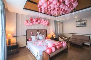 Postel nebo postele na pokoji v ubytování Seaside Resort Vung Tau