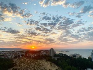 a view of the sunset from the top of a building at Kamenec Hotel in Nesebar