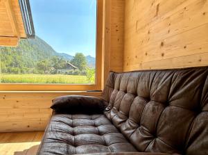 Posezení v ubytování Das Grünhaus - Dein Chalet in Grünau im Almtal