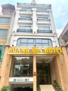 a building with a sign that reads home gla hotel at Hoàng Gia Hotel Hà Nội in Hanoi