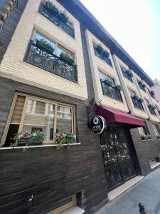 a building with windows and plants on the side of it at Aybar Hotel & Spa in Istanbul