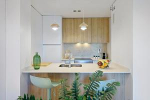 Η κουζίνα ή μικρή κουζίνα στο Hauzify I Apartament Mare Internum