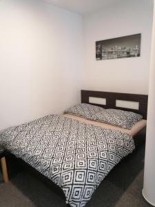 Posteľ alebo postele v izbe v ubytovaní Apartman 26 Mymara