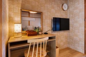 Uma TV ou centro de entretenimento em Maru Taisho