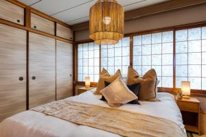 Cama ou camas em um quarto em Maru Taisho