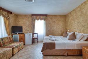 Postel nebo postele na pokoji v ubytování Hotel Rendez Vous