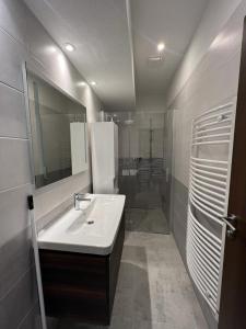 A bathroom at LUX apartmany Romantika CHOPOK 7, 19 Még 32 kép