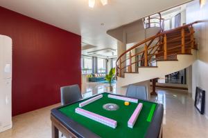 תמונה מהגלריה של Slow Pine Homestay בסאנשינג