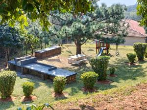 a park with a picnic table and a playground at Ocean View Villas F16 Port Edward in Port Edward