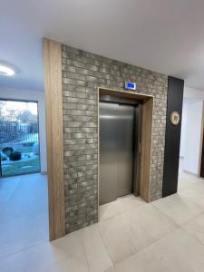 Fotografia z galérie ubytovania Apartament Smart Kamienica Grochów with free parking vo Varšave