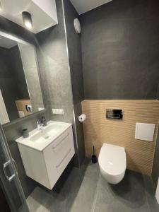 Kúpeľňa v ubytovaní Apartament Smart Kamienica Grochów with free parking