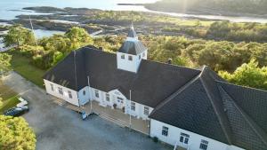 an aerial view of a white church with a steeple at Langesund Bad in Langesund
