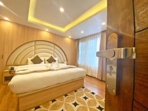 Letto o letti in una camera di Hotel Airport Gurkha