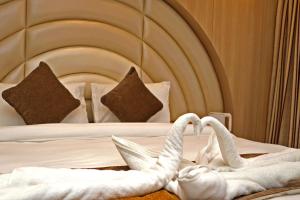 Letto o letti in una camera di Hotel Airport Gurkha