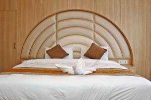 Letto o letti in una camera di Hotel Airport Gurkha