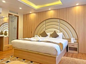 Letto o letti in una camera di Hotel Airport Gurkha