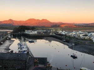 a view of a harbor with boats in the water at Banc Apartment 1 in Porthmadog