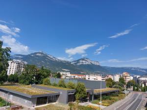 a view of a city with mountains in the background at Studio in Chambéry