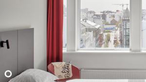 Postel nebo postele na pokoji v ubytování Center Hotels Plaza