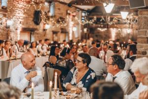 a group of people sitting at tables in a room at Cubley Hall in Penistone