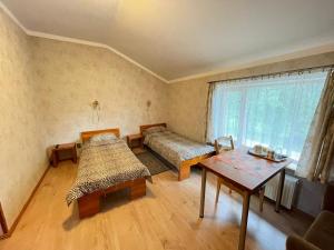 Postel nebo postele na pokoji v ubytování Parks Guest House