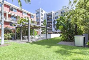 a park in front of a apartment building at 2-Bed Near Brisbane CBD with Pool, Sauna & BBQ in Brisbane