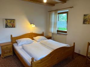 Postel nebo postele na pokoji v ubytování Haus Santner