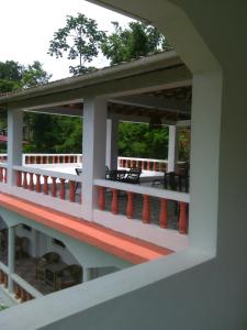a view of the balcony of a building at Polish Princess Guest House in Port Antonio