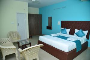 Φωτογραφία από το άλμπουμ του Hotel V M Comfort στη Μπανγκαλόρ +14 φωτογραφίες