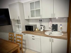 Kuchnia lub aneks kuchenny w obiekcie Hostel Sportowa