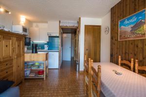 Kuchyň nebo kuchyňský kout v ubytování Le Balcon d'Ancelle - Appt vue montagne + 3 fotografie