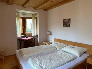 Postel nebo postele na pokoji v ubytování Haus Santner