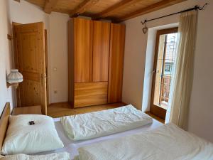 Postel nebo postele na pokoji v ubytování Haus Santner