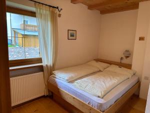Postel nebo postele na pokoji v ubytování Haus Santner