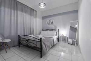 Ένα ή περισσότερα κρεβάτια σε δωμάτιο στο Thanos Luxury home