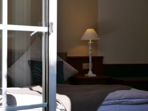 Postel nebo postele na pokoji v ubytování Hotel Bremer