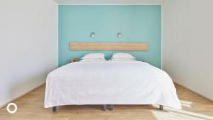 Postel nebo postele na pokoji v ubytování Center Hotels Plaza