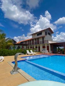 The swimming pool at or close to Pousada Monte das Serras