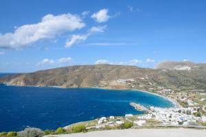an aerial view of a town and the ocean at Uranos Studios in Amorgos