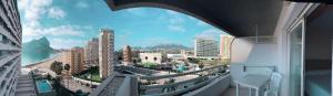 a view of a city from a balcony of a building at AR Roca Esmeralda & SPA Hotel in Calpe