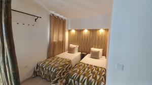 Postel nebo postele na pokoji v ubytování Casa Lusitano by Valada Village