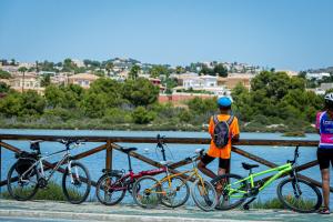 a group of bikes parked next to a fence at AR Roca Esmeralda & SPA Hotel in Calpe