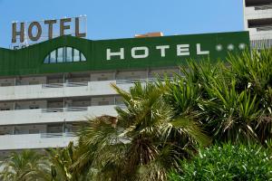 a hotel with a sign on top of a building at AR Roca Esmeralda & SPA Hotel in Calpe