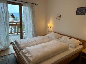 Postel nebo postele na pokoji v ubytování Haus Santner