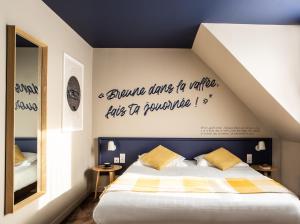 Postel nebo postele na pokoji v ubytování Hôtel Antares & Spa
