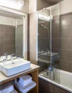 Koupelna v ubytování Hôtel Antares & Spa