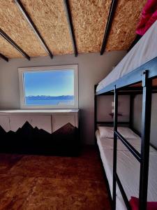 Postel nebo postele na pokoji v ubytování Moving Hostel Travel Bar