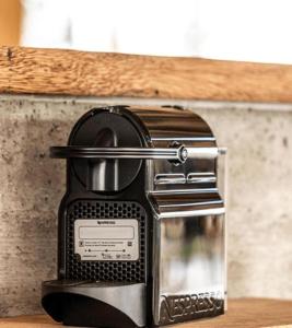 a toaster sitting on top of a counter at Layla Glamping in Nir Dawid